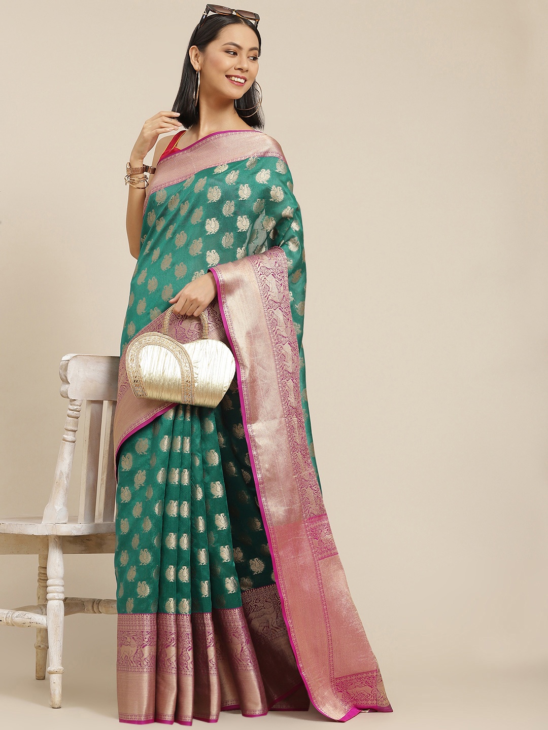 

Silk Land Teal Green & Golden Woven Design Zari Kanjeevaram Saree