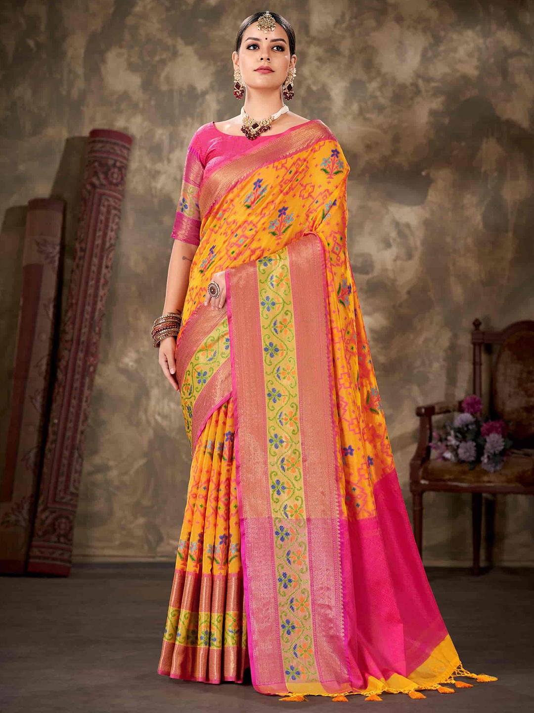 

Silk Land Yellow & Pink Ethnic Motifs Pochampally Saree
