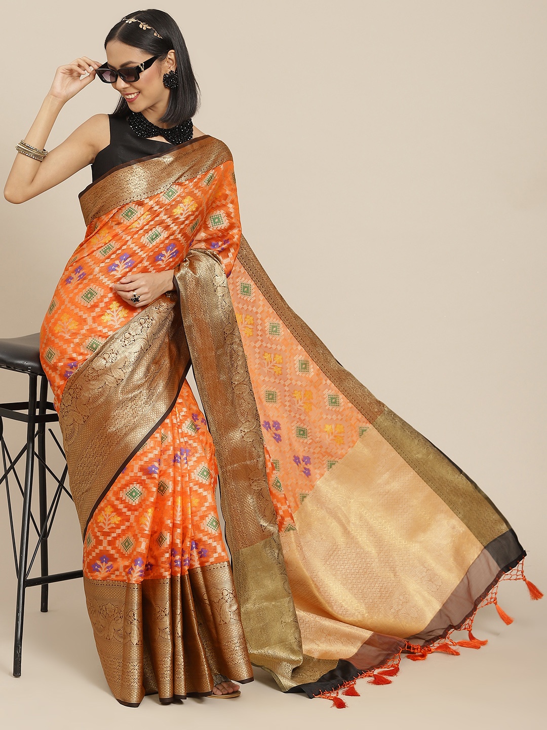 

Silk Land Orange & Green Floral Ikat Saree