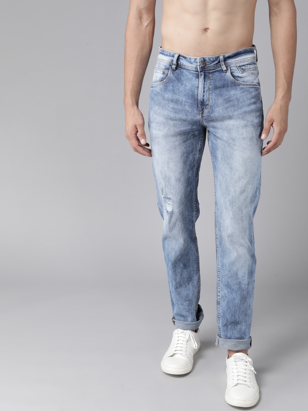 

The Roadster Lifestyle Co. Men Blue Slim Tapered Fit Low Distress Light Fade Jeans