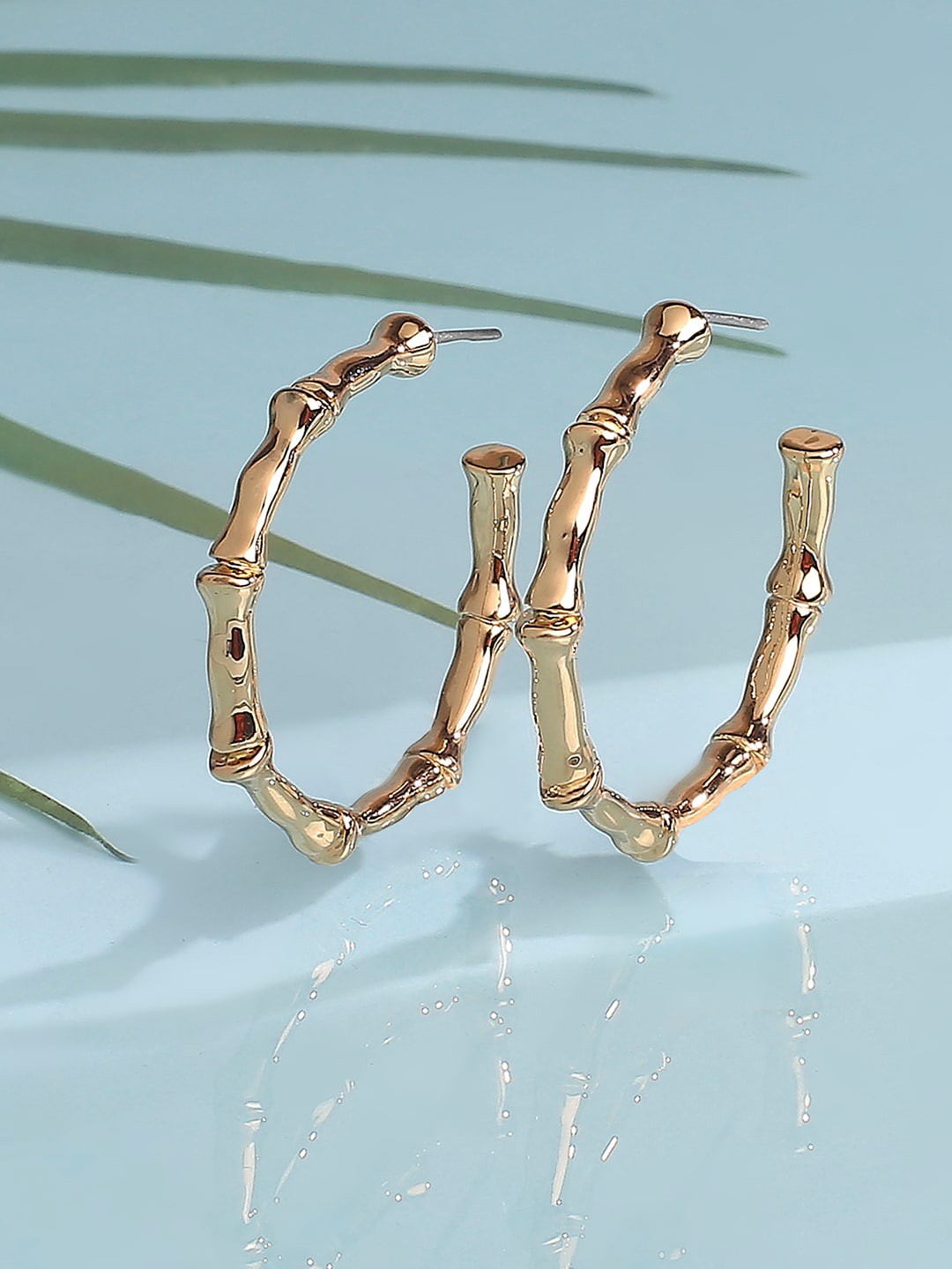 

Lilly & sparkle Gold-Toned Contemporary Half Hoop Earrings