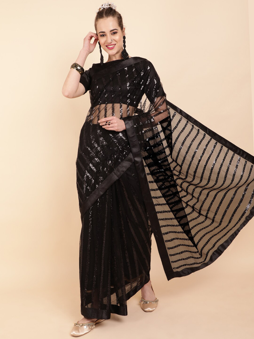 

Sangria Black Striped Sequinned Net Saree
