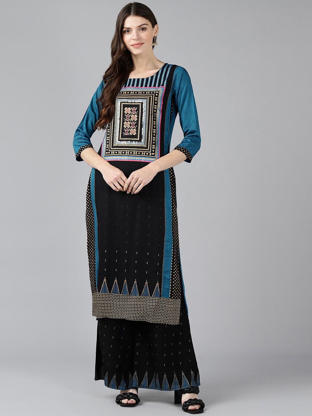 

Bani Women Turquoise Blue Embroidered Layered Liva Kurti with Sharara