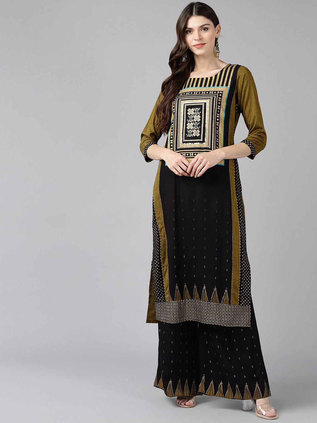 

Bani Women Mustard Yellow Ethnic Motifs Printed Panelled Liva Kurta with Palazzos