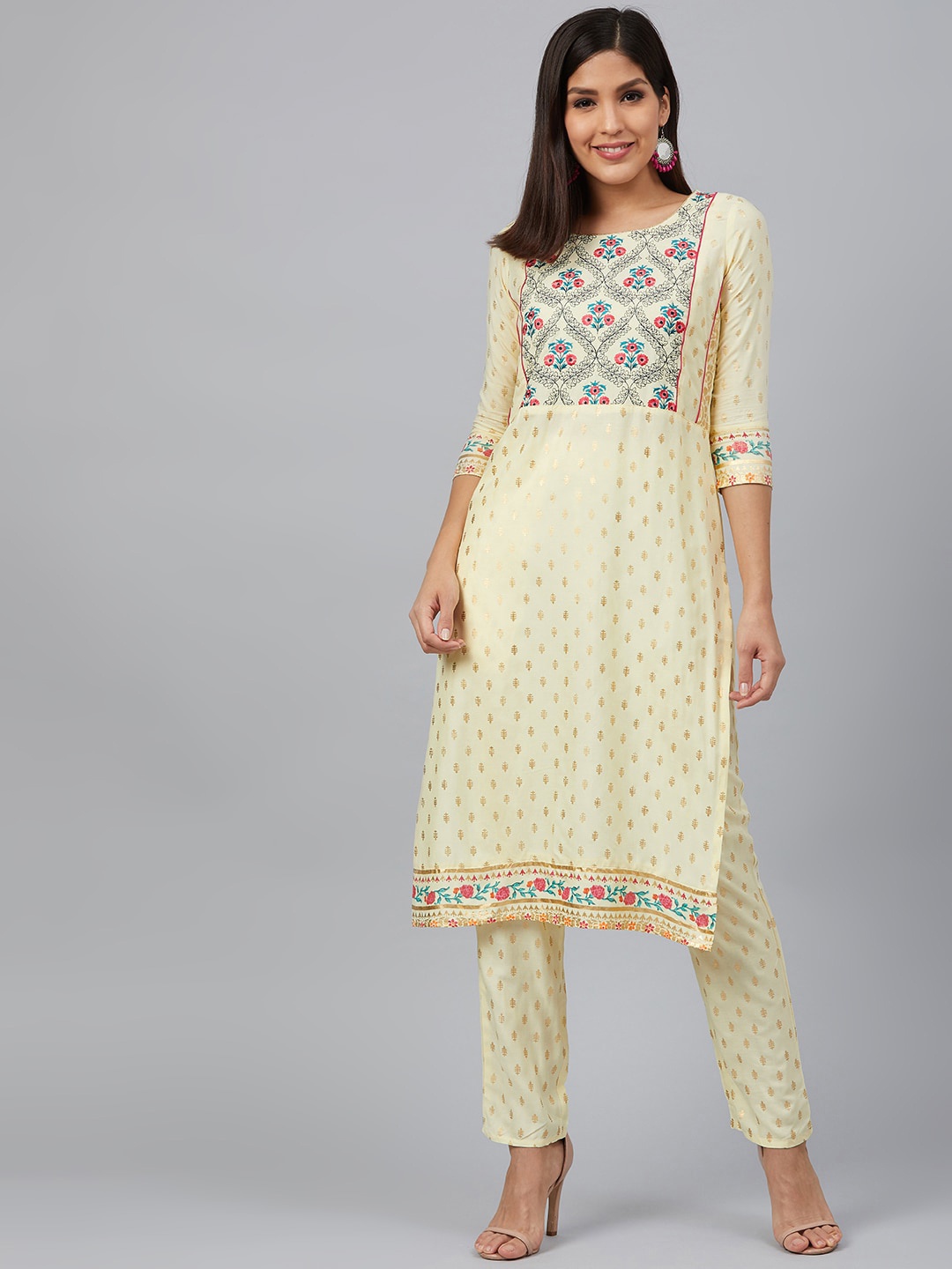 

Bani Women Yellow Printed Liva Straight Kurta with Trousers