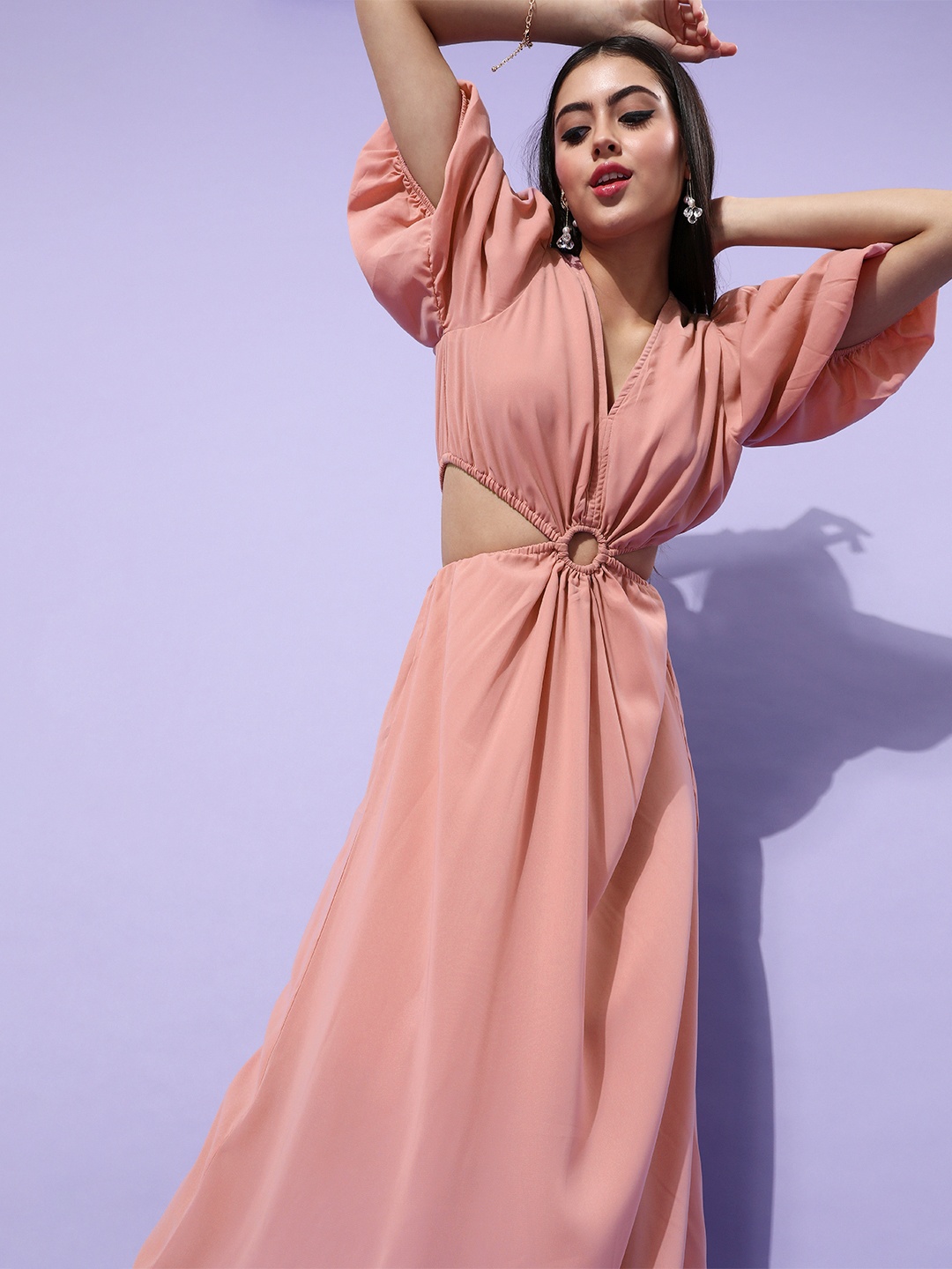 

Zastraa Women Stunning Peach Solid Cut Out Dress
