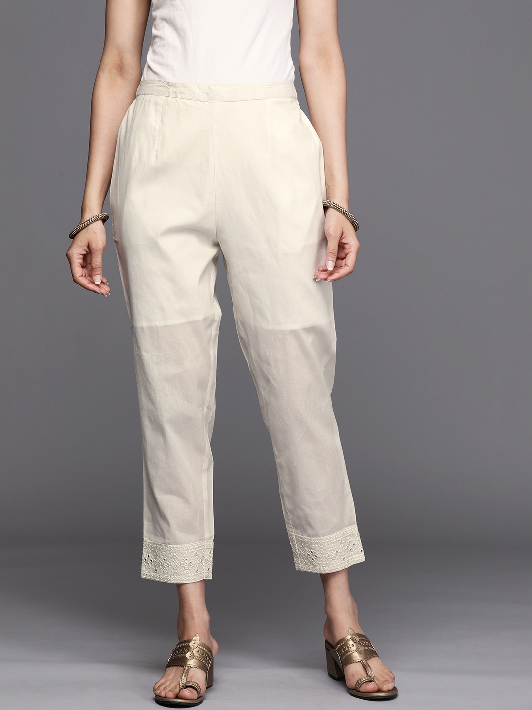 

Libas Women Off White Ethnic Motifs Embroidered Pure Cotton Trousers