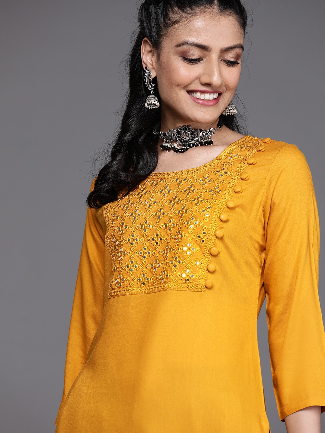 

Libas Women Mustard Yellow Yoke Design Mirror Work Kurta