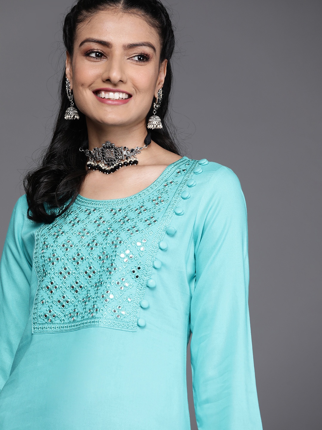 

Libas Women Blue Yoke Design Mirror Work Pastels Kurta