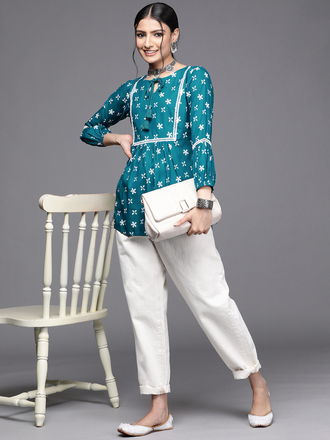 

Libas Women Teal Blue & White Ethnic Motifs Printed Pleated Kurti