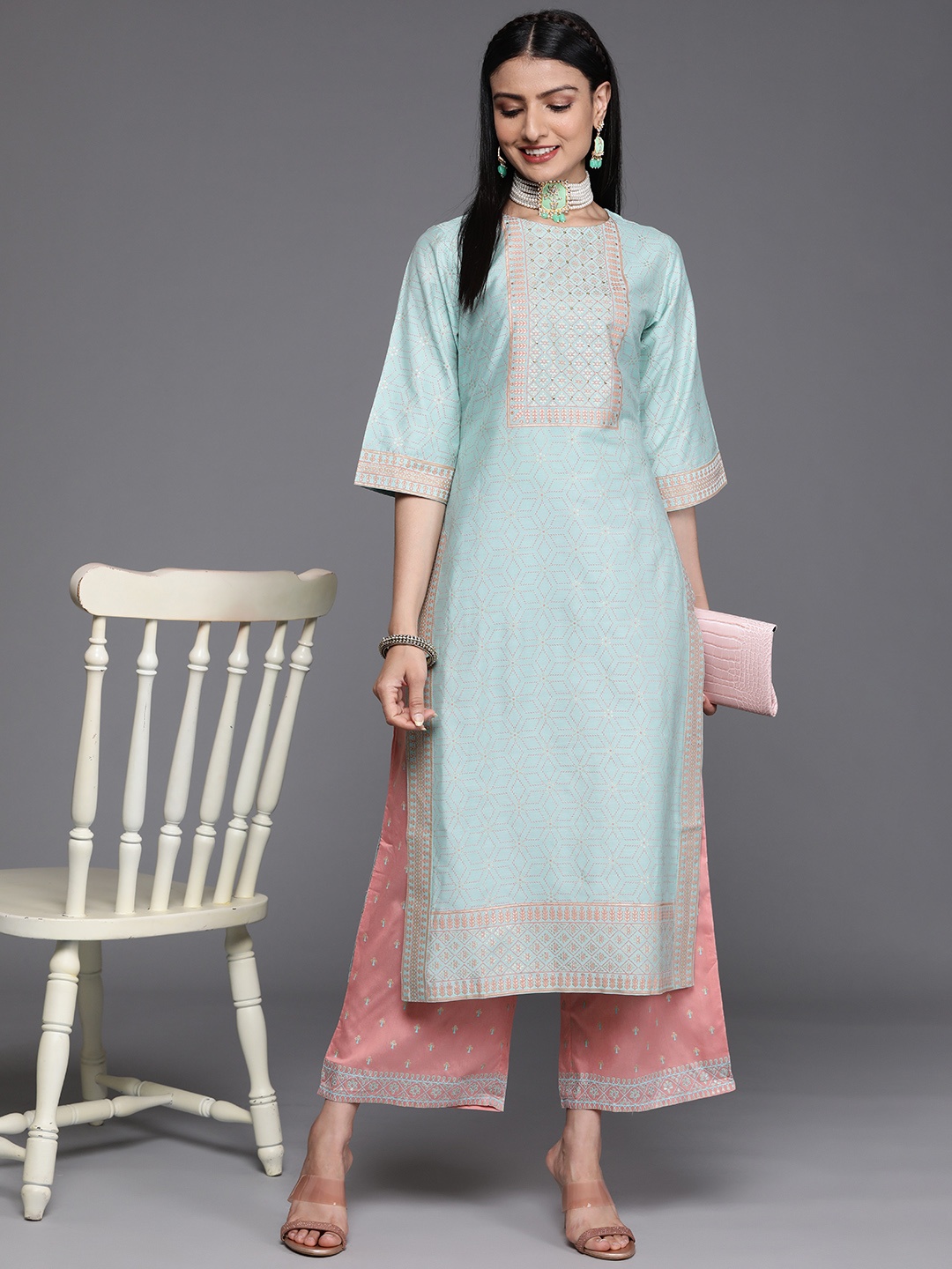 

Libas Women Blue & Peach-Coloured Ethnic Motifs Yoke Design Flared Sleeves Kurta