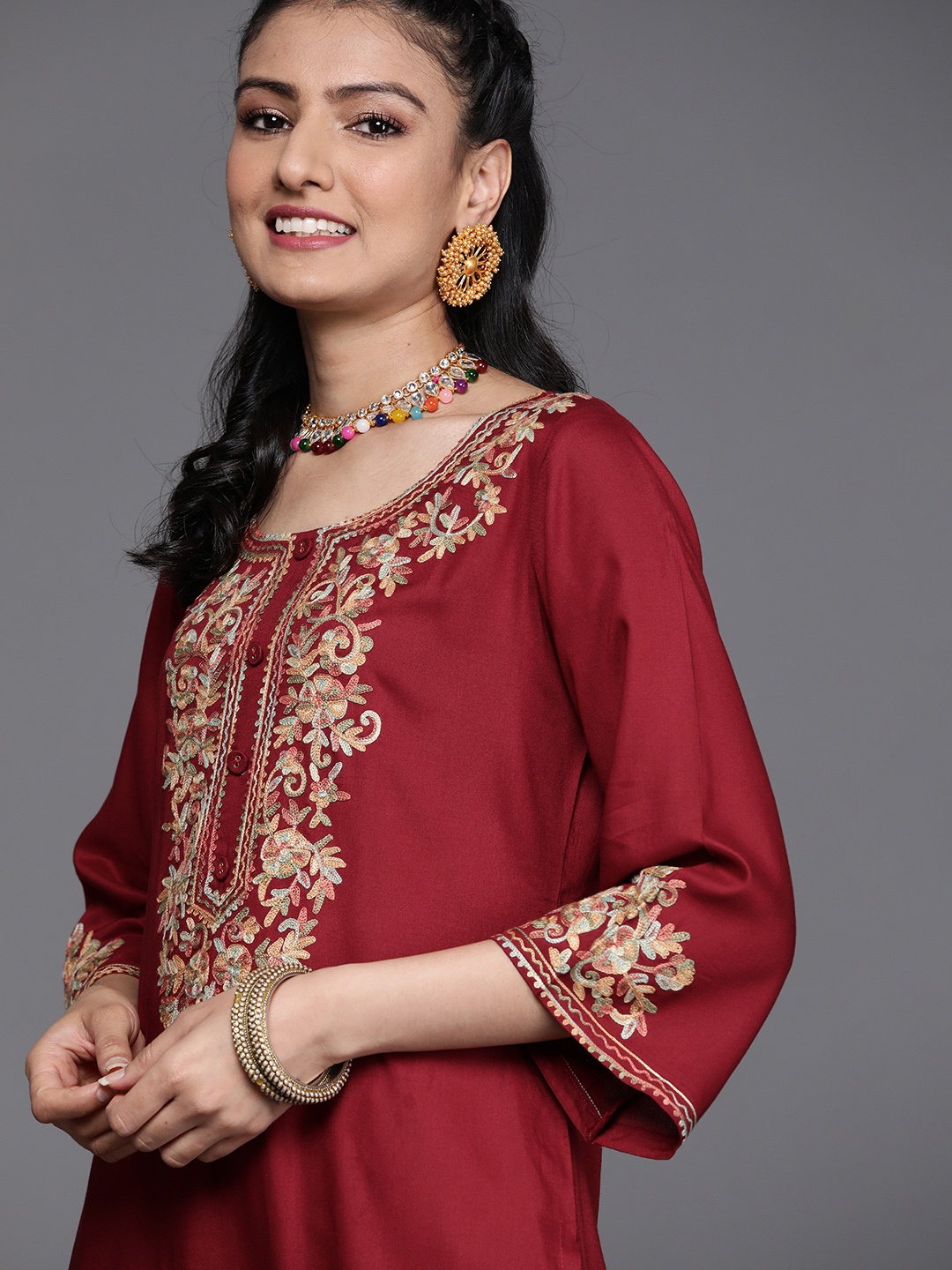

Libas Women Maroon Floral Yoke Design Flared Sleeves Thread Work Kurta