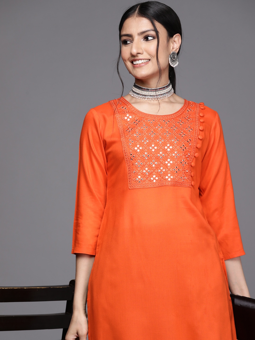 

Libas Women Orange Yoke Design Mirror Work Kurta