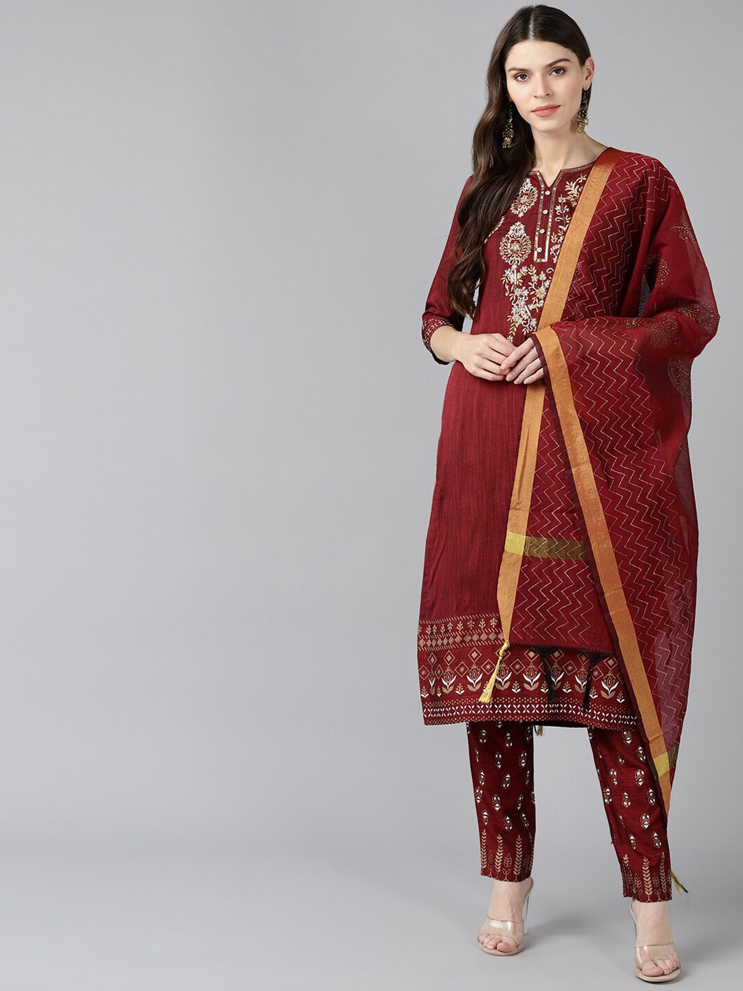 

Bani Women Red Ethnic Motifs Embroidered Beads and Stones Liva Kurta with Trousers & With Dupatta