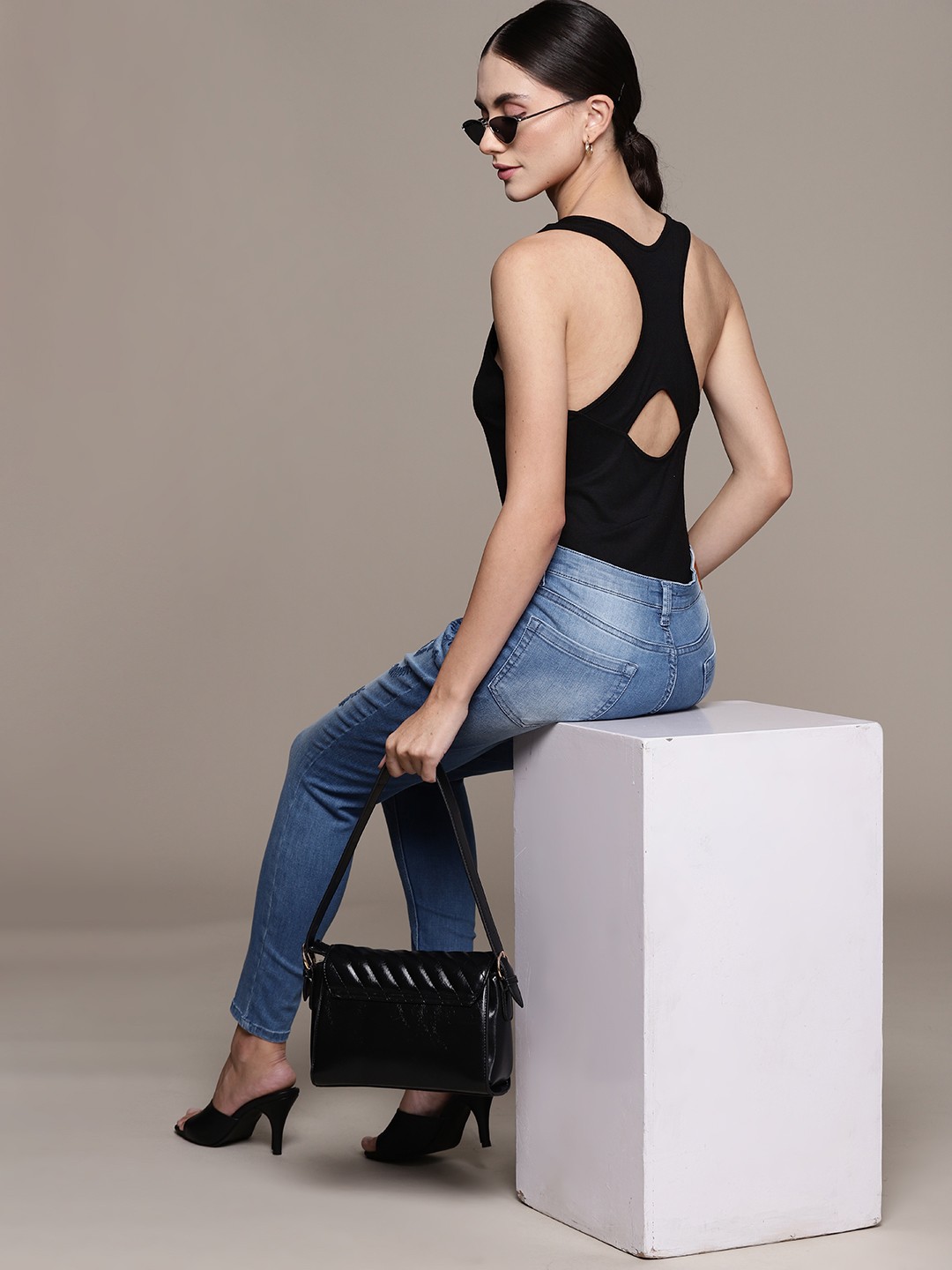 

bebe Women Jet Black Season Staple Cut-Out Back Bodysuit