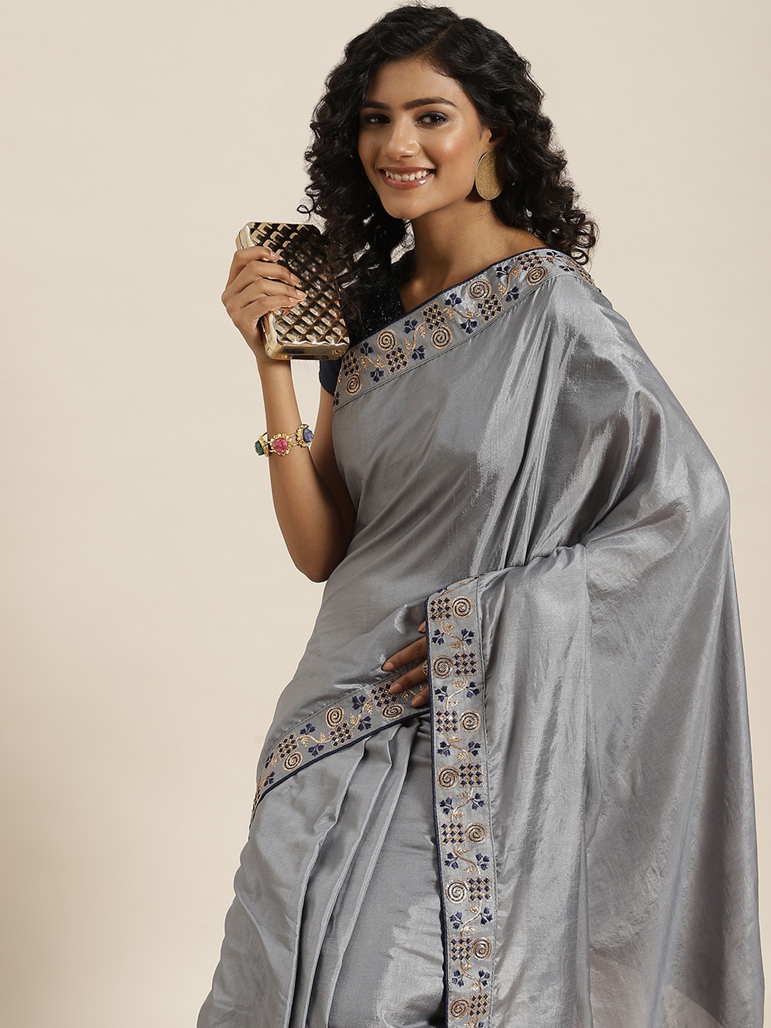 

Sangria Grey Solid Embroidered Border Saree