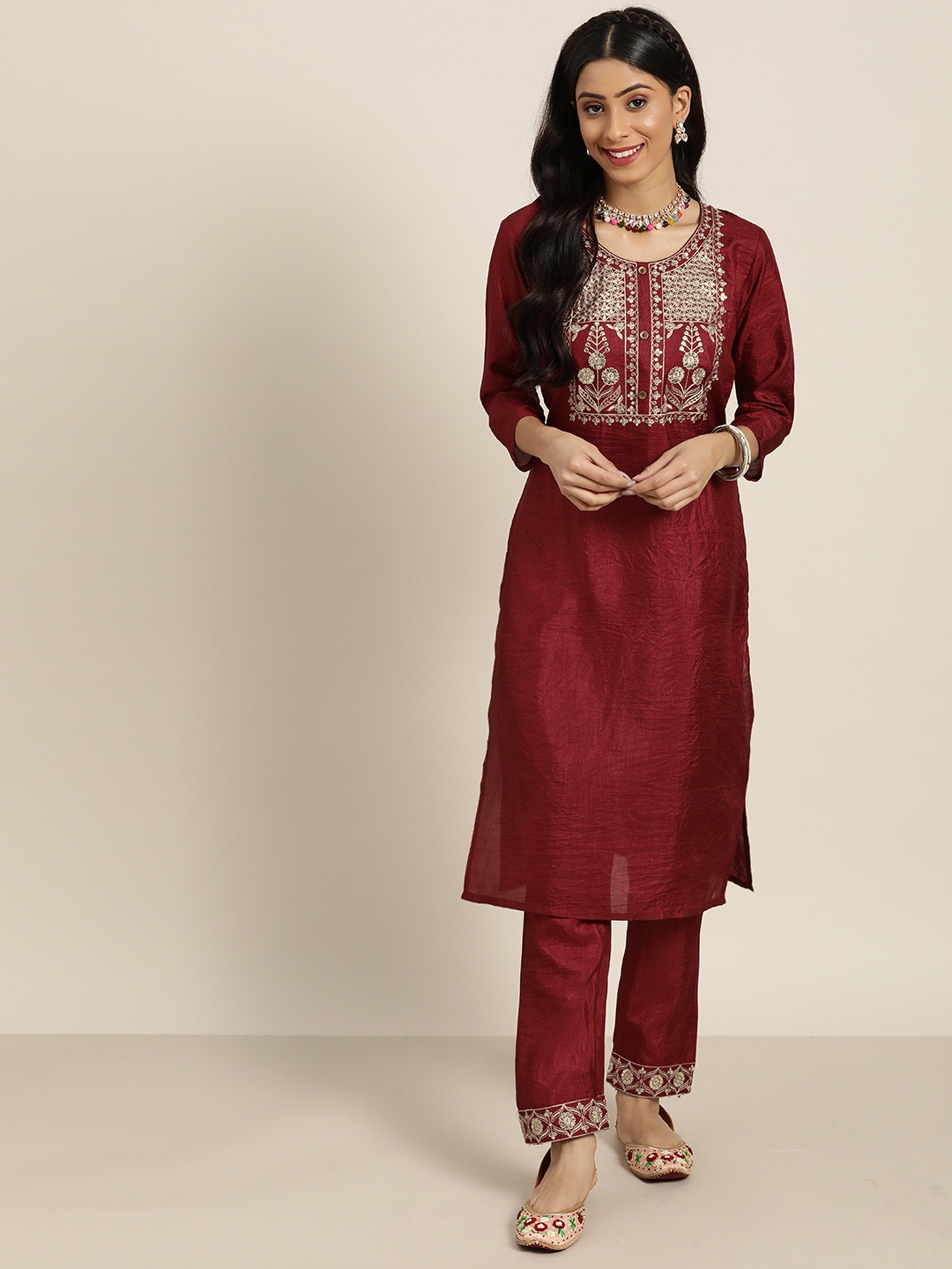 

Sangria Women Maroon Ethnic Motifs Sequinned Embroidered Kurta with Trousers