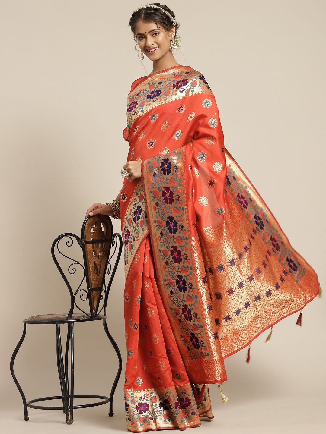 

Somras Orange & Beige Ethnic Motifs Zari Silk Blend Saree