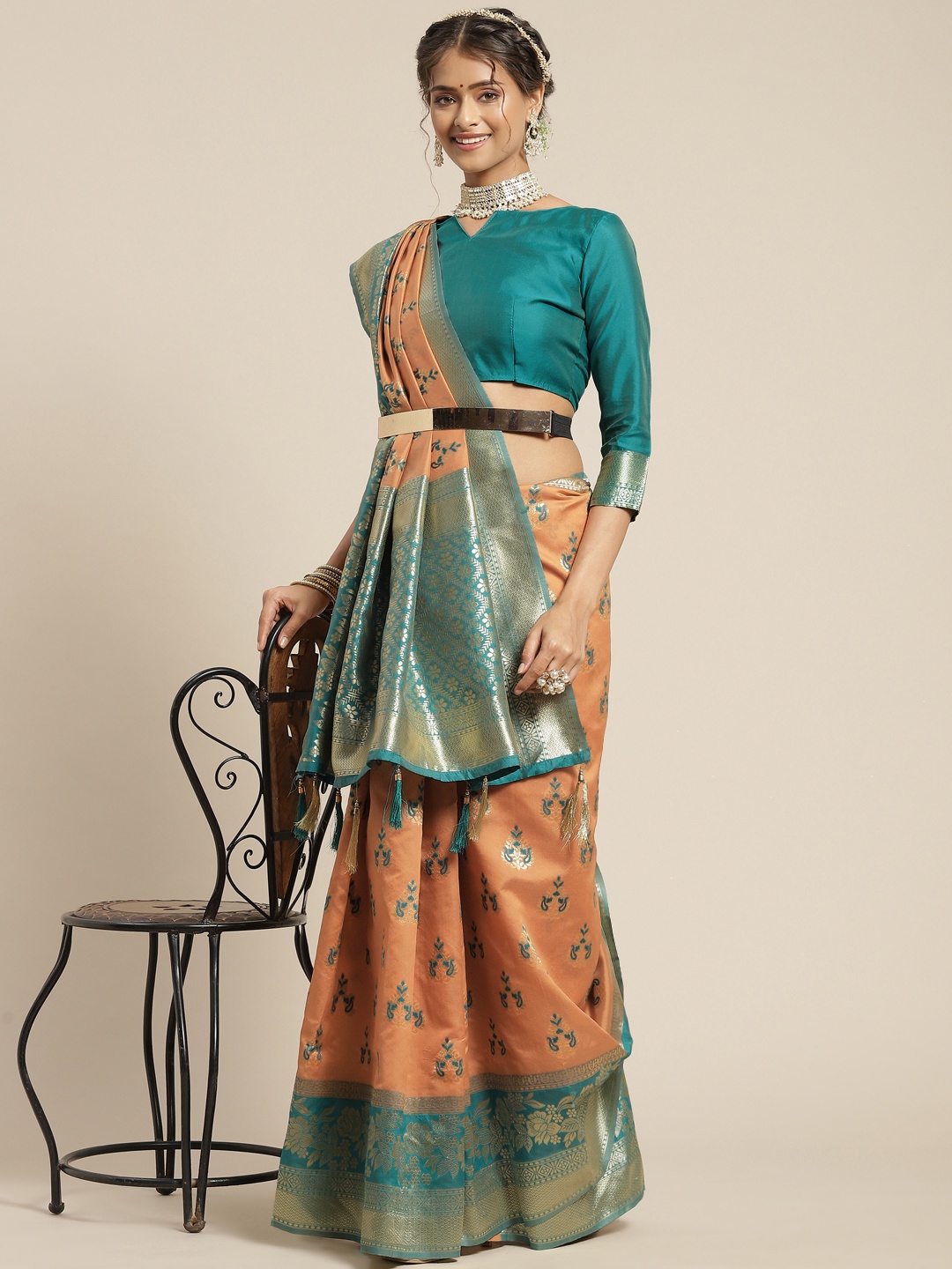

Somras Coral Orange & Green Ethnic Motifs Zari Silk Blend Saree