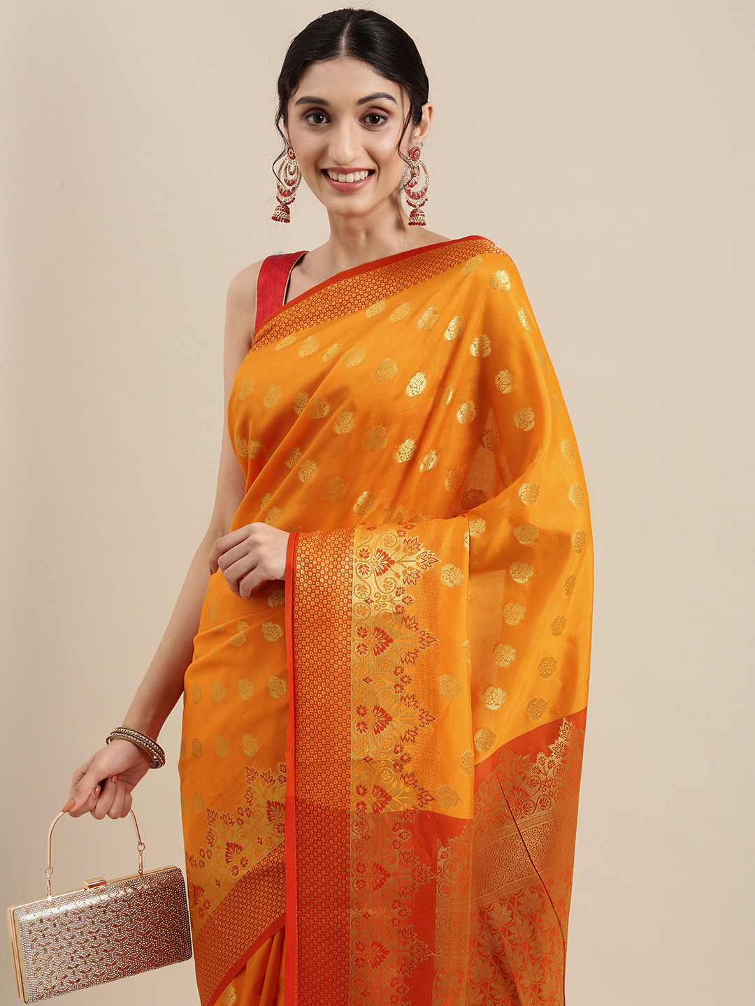 

Mitera Orange & Gold Ethnic Motifs Zari Silk Cotton Celebrity Banarasi Saree