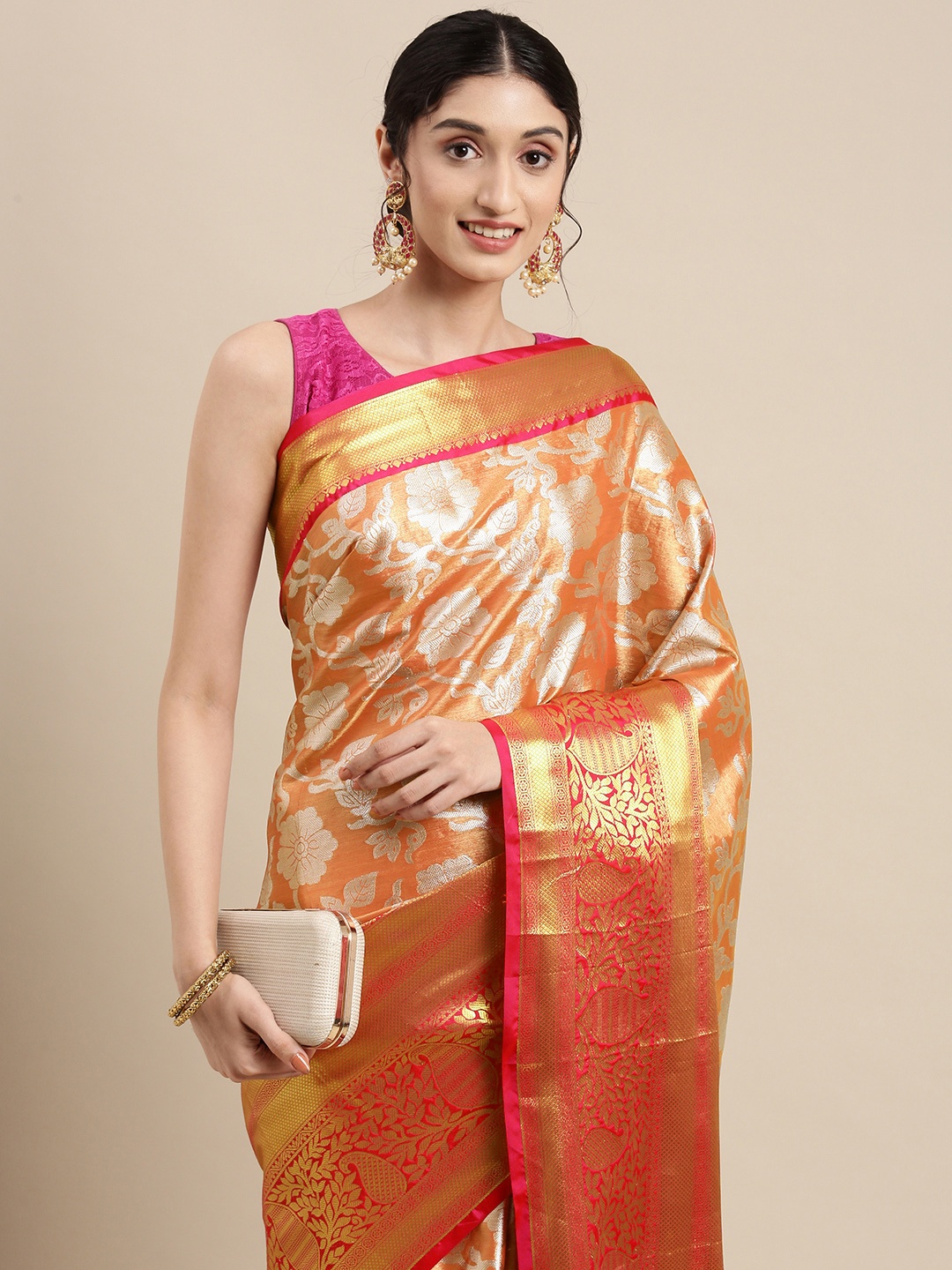 

Mitera Orange & Silver Floral Zari Tissue Celebrity Banarasi Saree