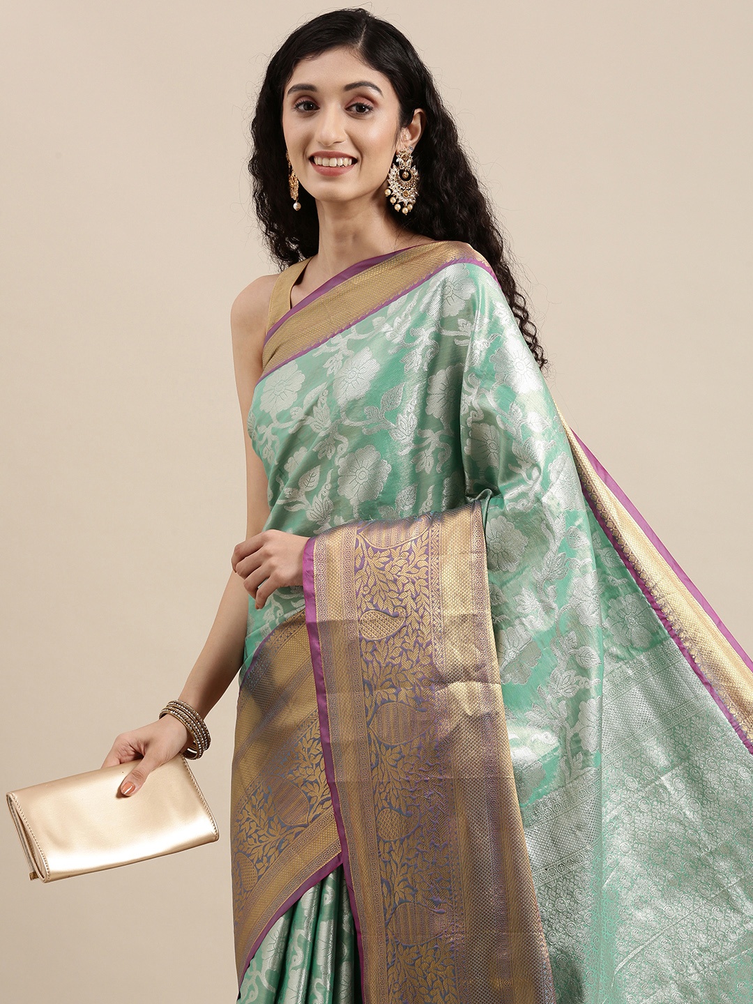 

Mitera Blue & Silver Floral Zari Tissue Celebrity Banarasi Saree