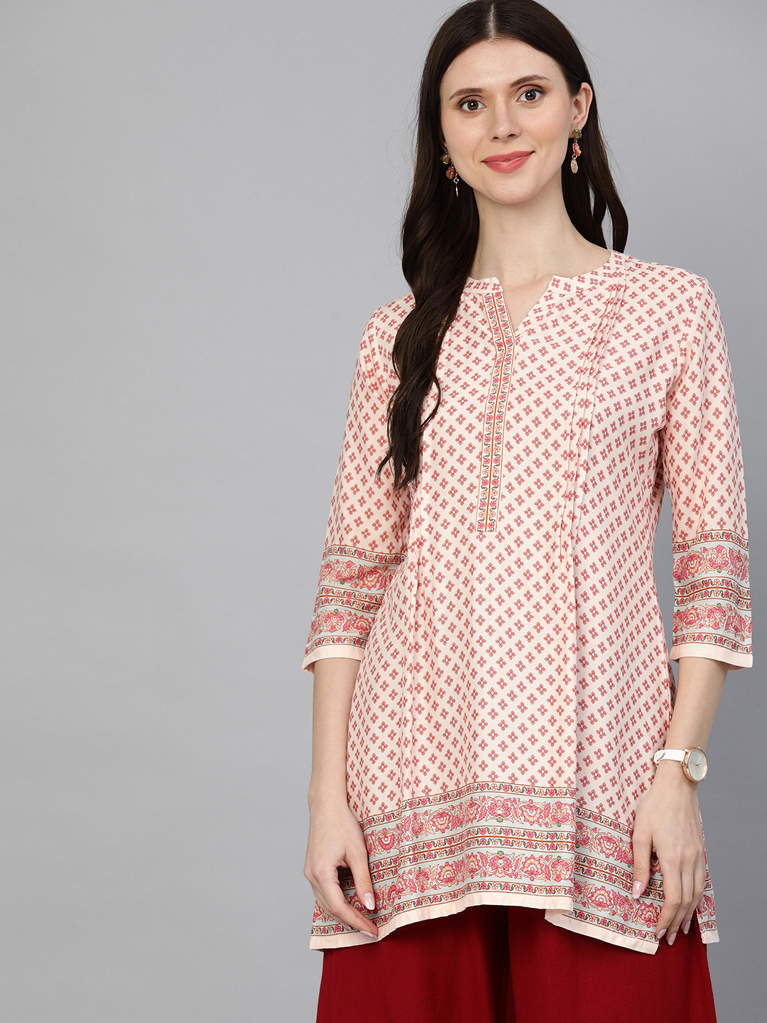 

ETIQUETTE White & Peach-Coloured Ethnic Motifs Printed Kurti