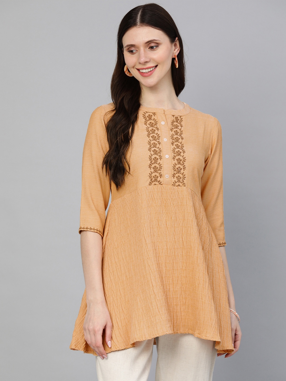 

ETIQUETTE Peach-Coloured Ethnic Motifs Embroidered Detail Kurti