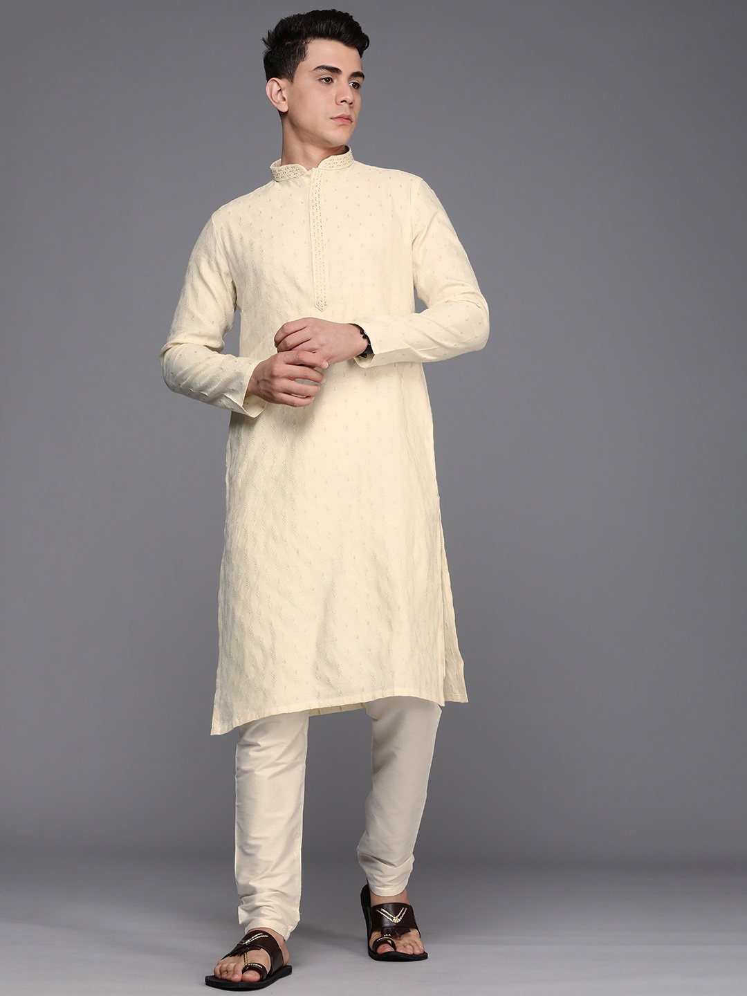 

Manyavar Men Cream-Coloured Jacquard Self Design Thread Work Kurta with Pyjamas