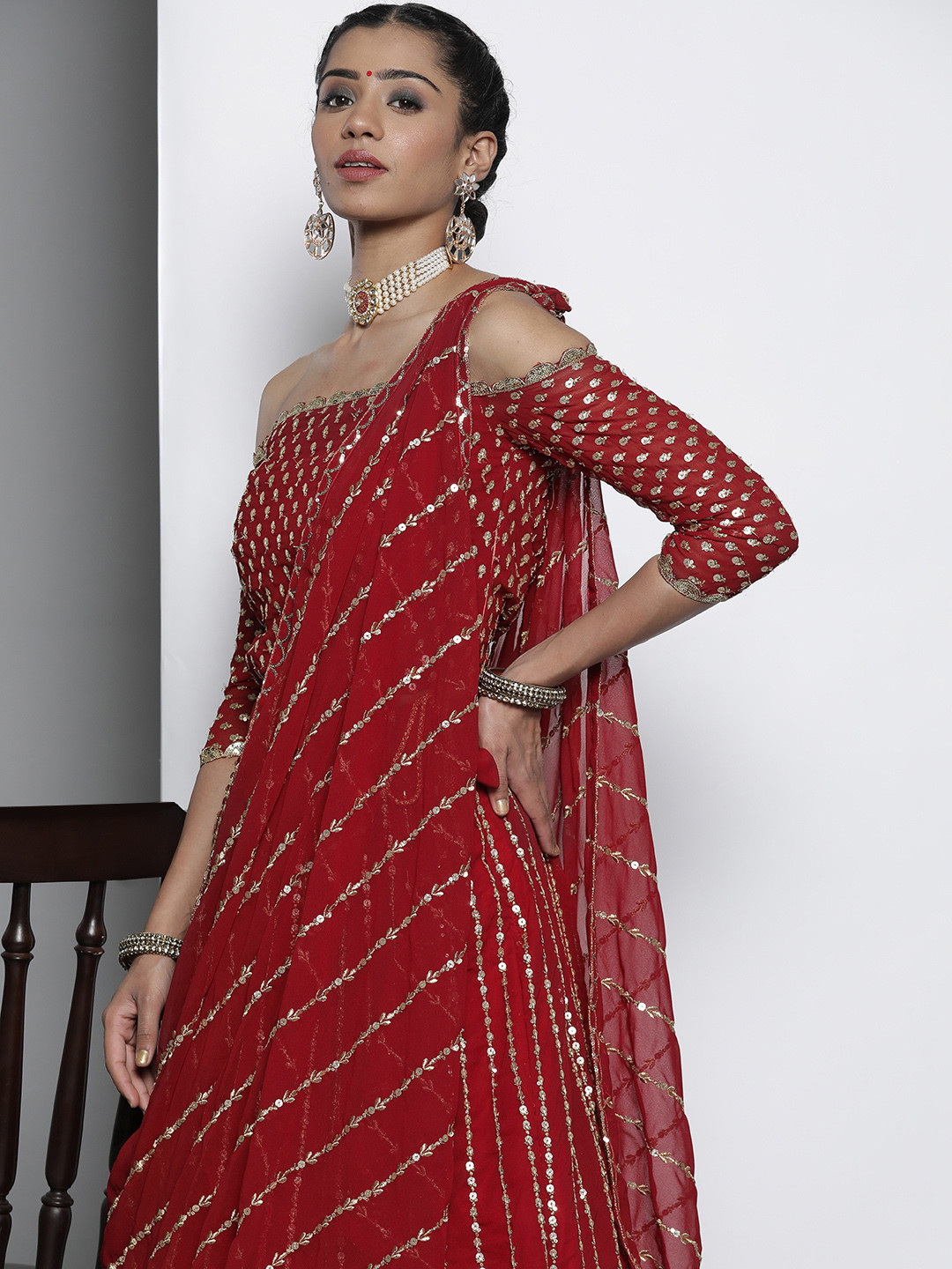 

DRESSTIVE Red & Goldn Sequinned Semi-Stitched Lehenga & Unstitched Blouse With Dupatta