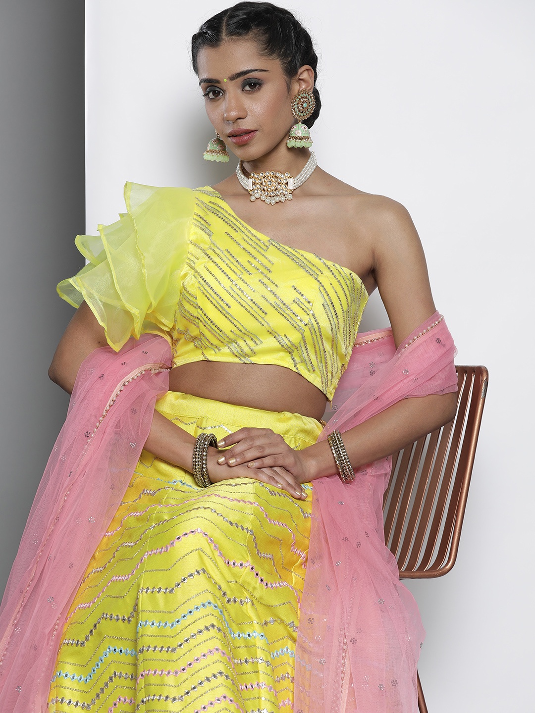 

DRESSTIVE Yellow & Golden Embroidered Sequinned Unstitched Lehenga & Blouse With Dupatta