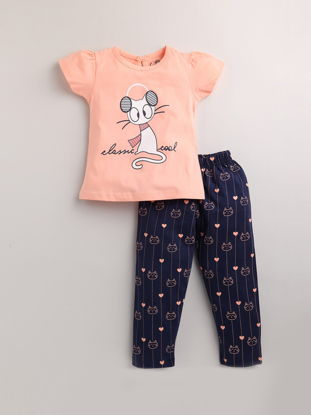 

Eieio Girls Peach-Coloured & Black Printed Cotton Night suit