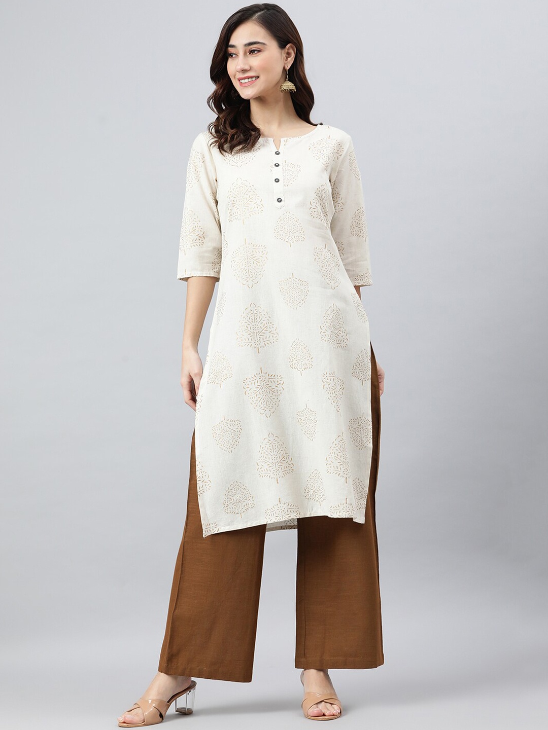 

Janasya Women Beige Cotton Flex Floral Print Kurta with Palazzo