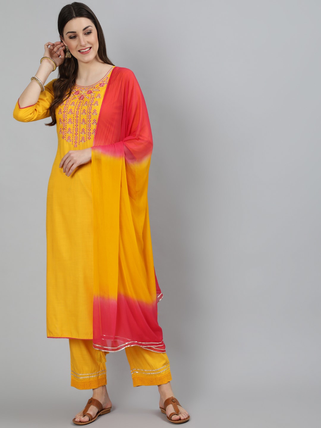 

KIMAYRA Women Mustard Yellow Embroidered Kurta Trousers Set With Dupatta