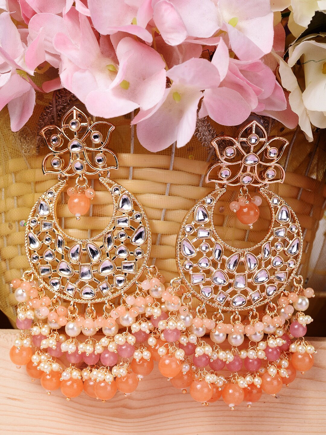 

Saraf RS Jewellery Orange & Gold Plated Kundan Studded Contemporary Chandbalis Earrings