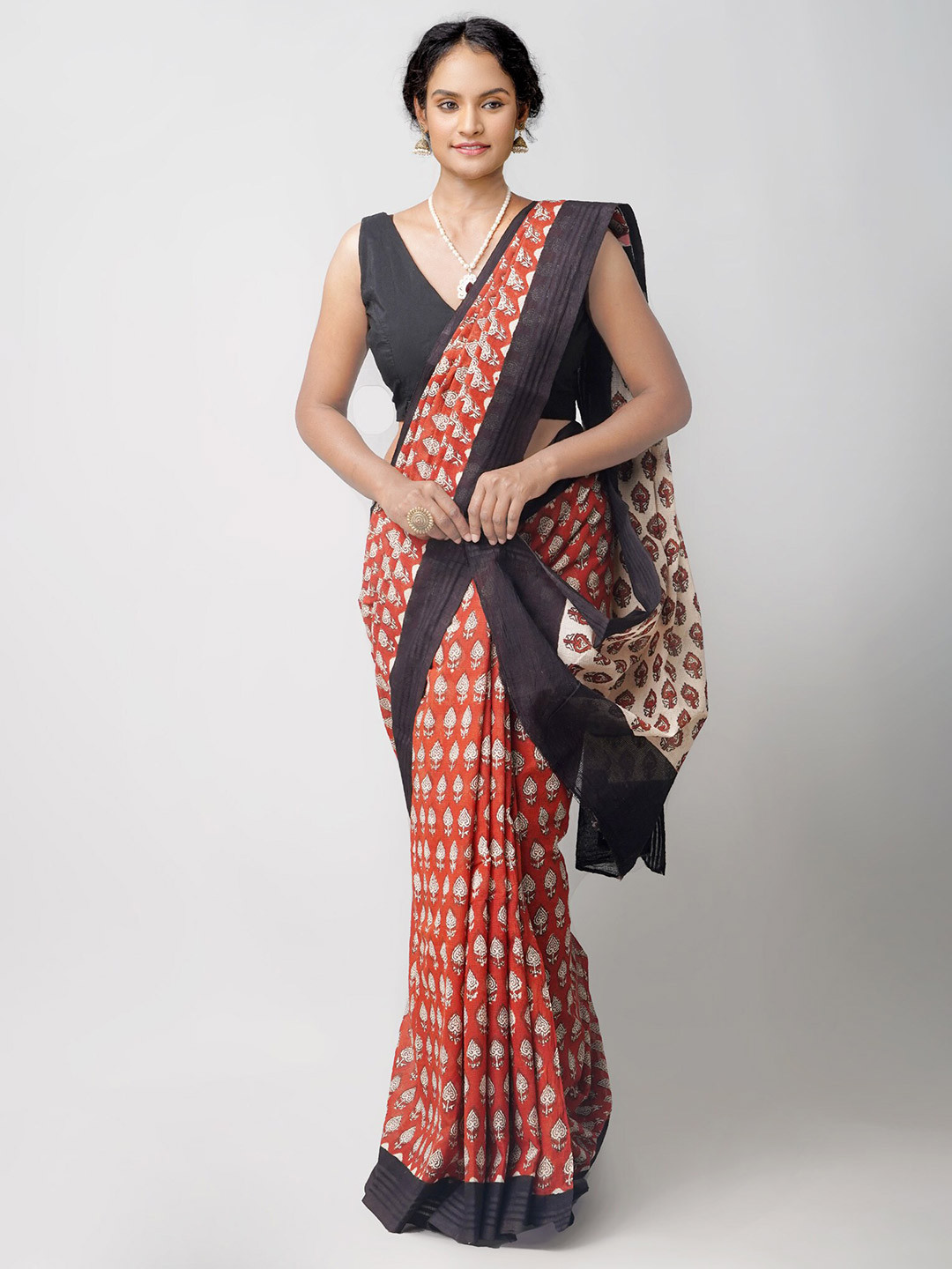 

Unnati Silks Red & Beige Floral Pure Cotton Bagru Saree