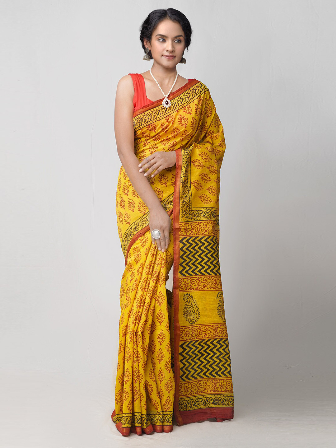

Unnati Silks Yellow & Red Ethnic Motifs Bagru Zari Silk Cotton Chanderi Saree