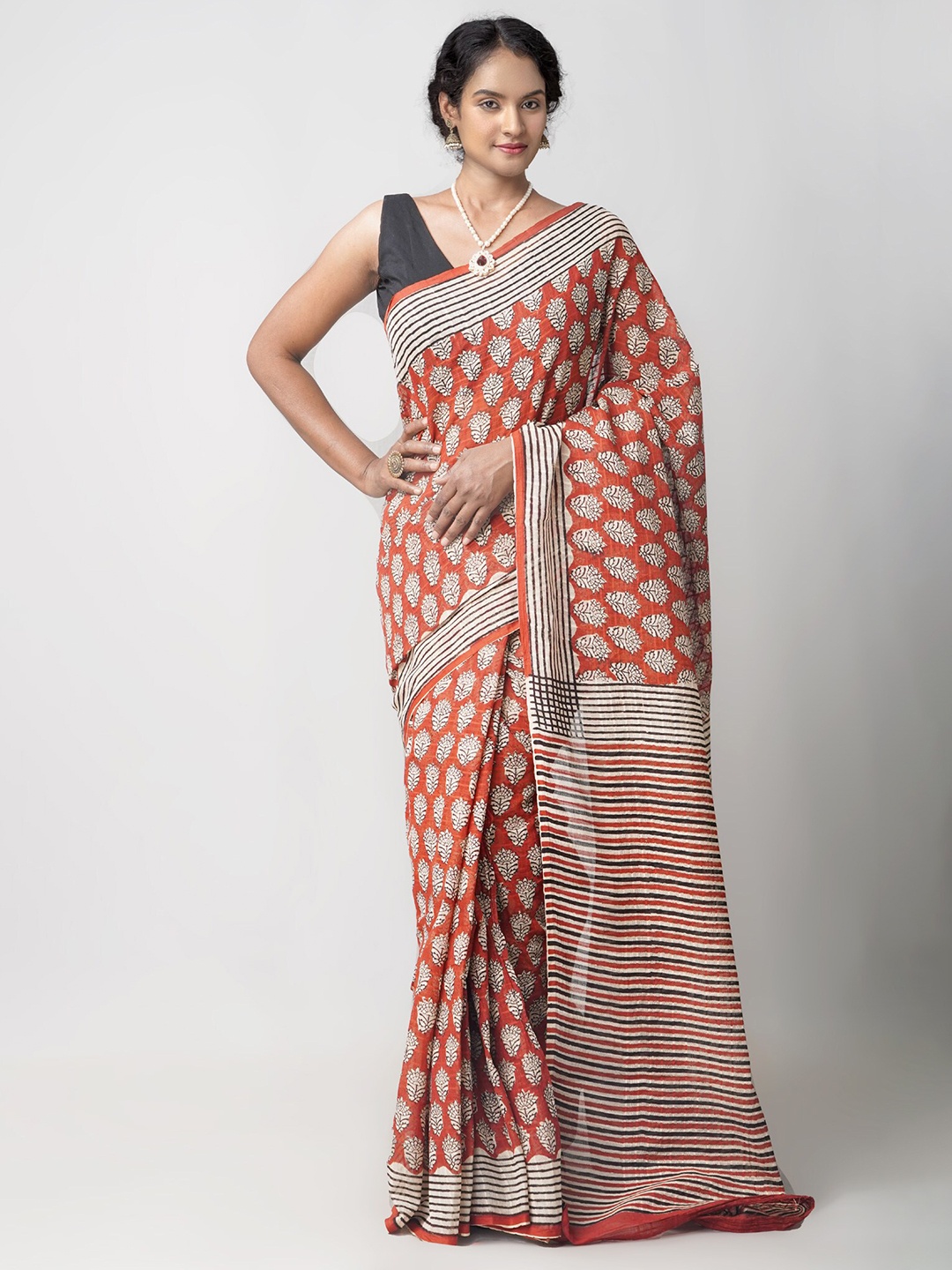 

Unnati Silks Rust & Black Ethnic Motifs Pure Cotton Bagru Saree