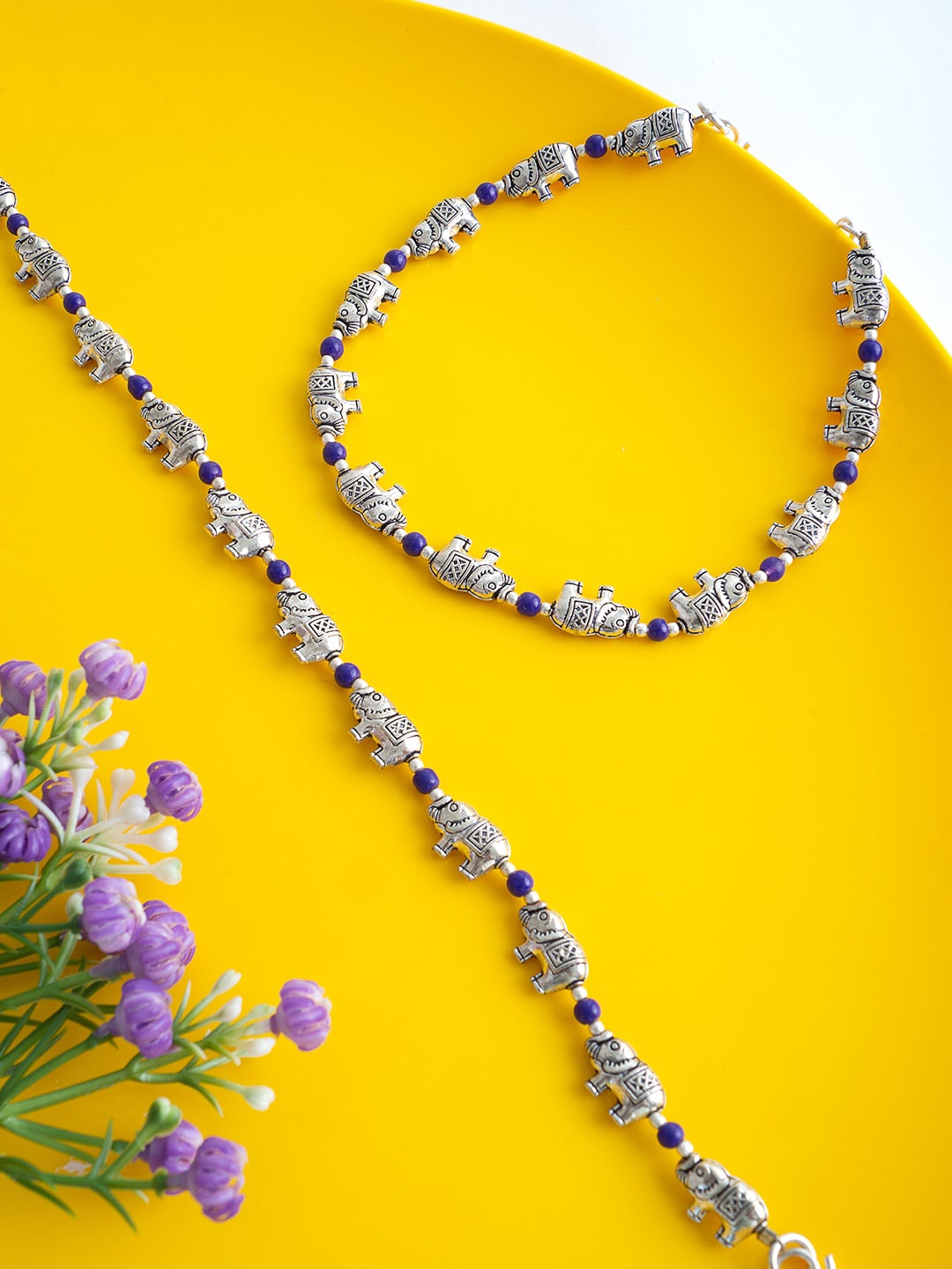 

Golden Peacock Set Of 2 Silver-Toned Purple Beaded Elephant Charm Anklets