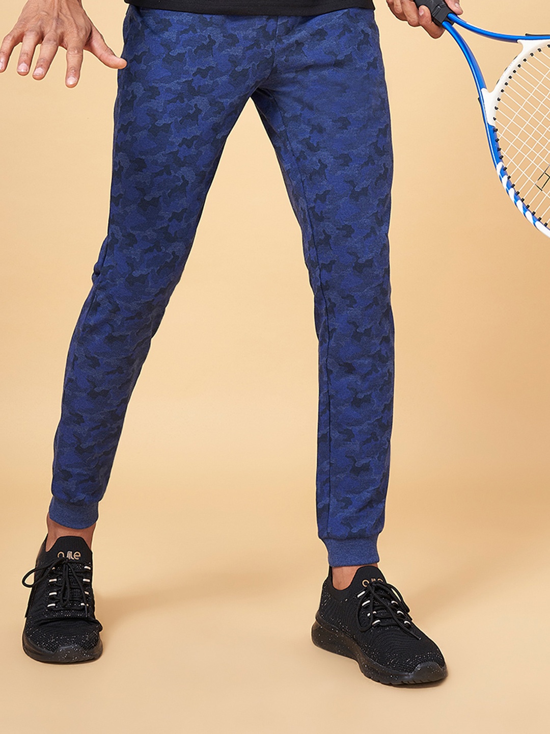 

Ajile by Pantaloons Men Blue & Black Camouflage Printed Pure Cotton Track Pants