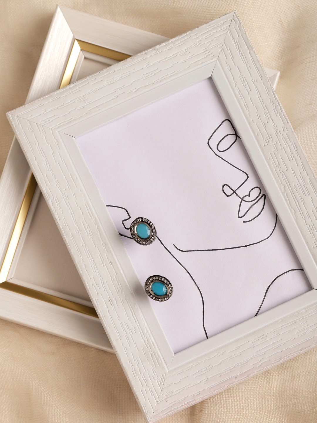 

Ruby Raang Blue Circular Studs Earrings