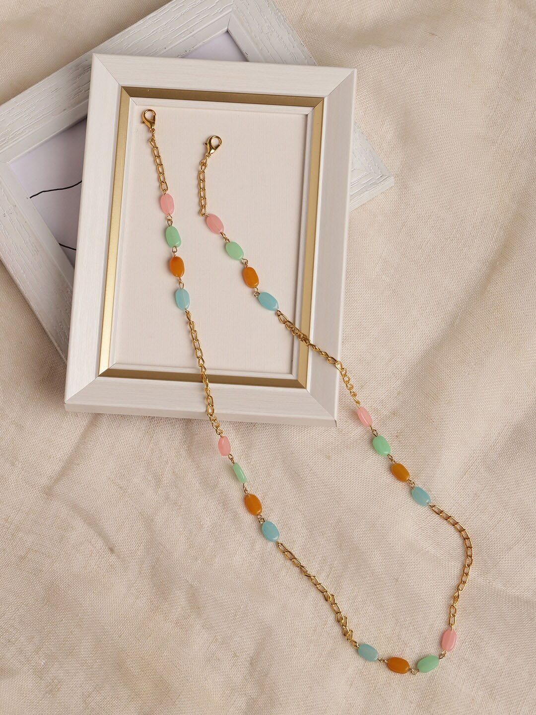 

Ruby Raang Gold Plated & Multicolored Beaded Mask chain