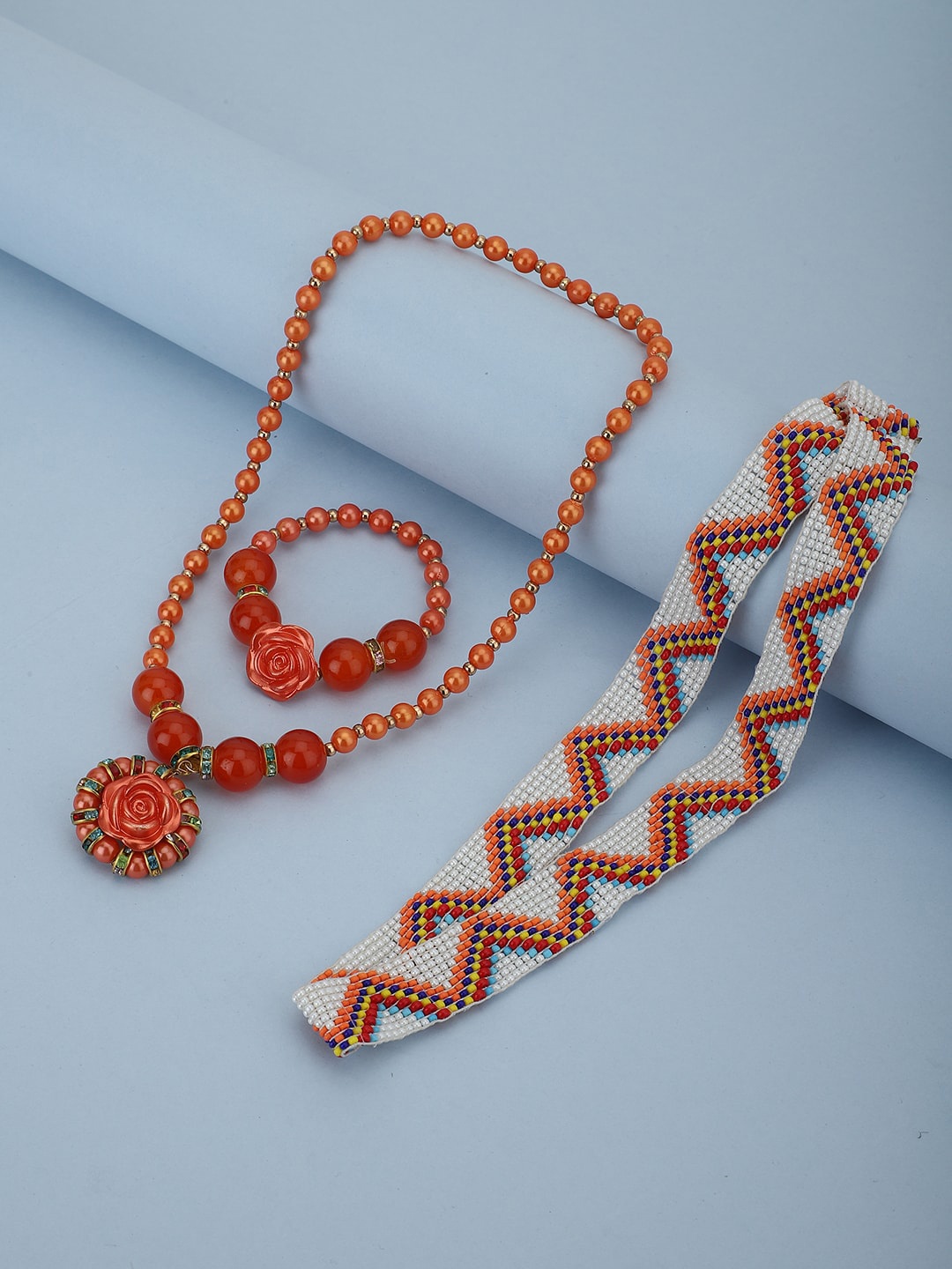 

Carlton London Girls Red Stone Studded & Beaded Jewellery Set