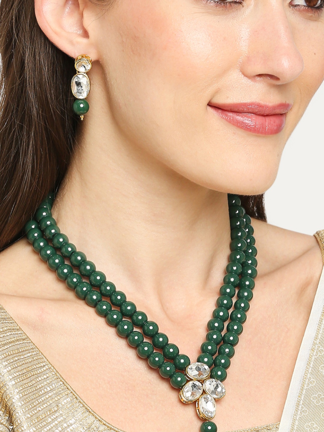 

OOMPH Gold Toned & Green Beads Kundan Studded Jewellery Set