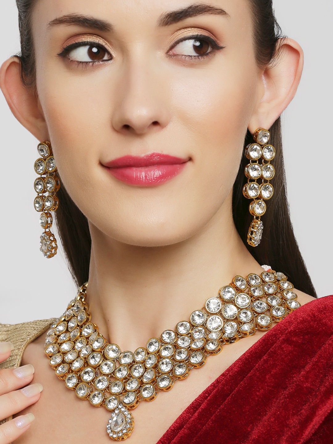 

OOMPH Gold Kundan Studded Choker Jewellery Set