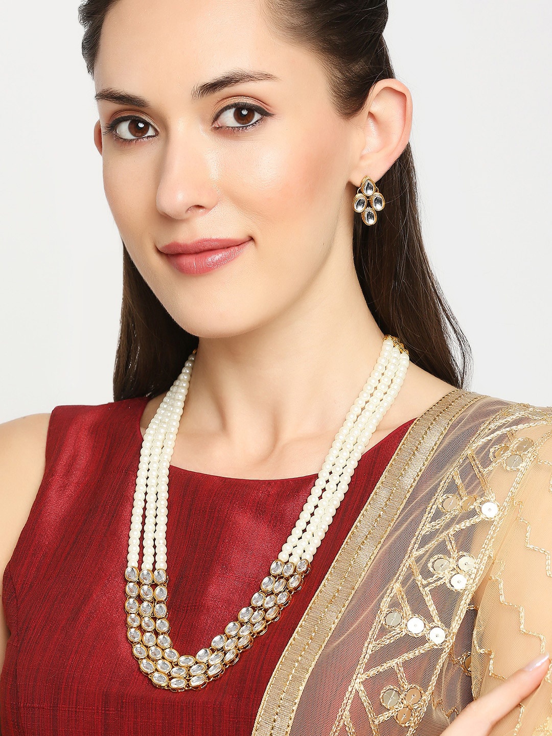 

OOMPH White & Gold-Toned Kundan Studded & Pearls Beaded Jadau Jewellery Set