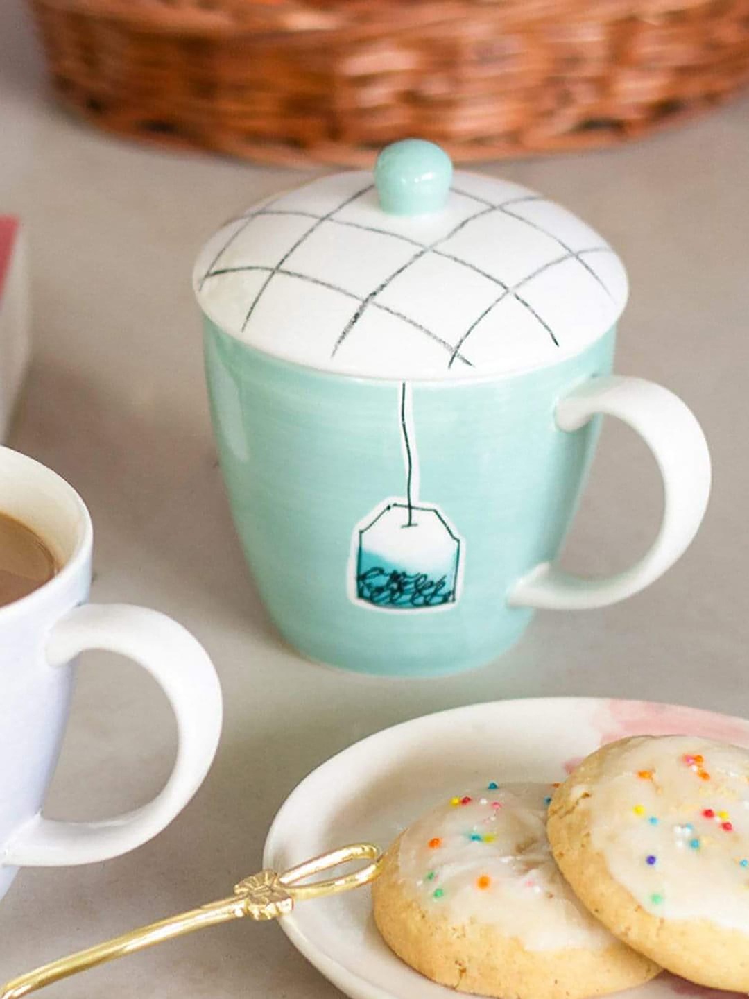 

The Wishing Chair Teal & White Hand Painted Printed Stoneware Glossy Mugs Set