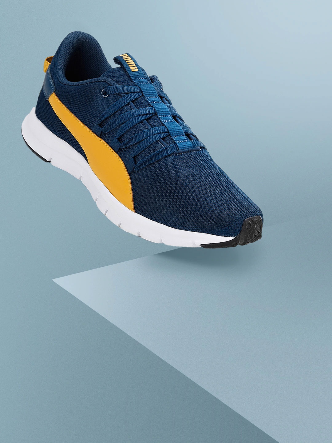 

Puma Men Navy Blue & Mustard Yellow Woven Upper Ealing Running Shoes