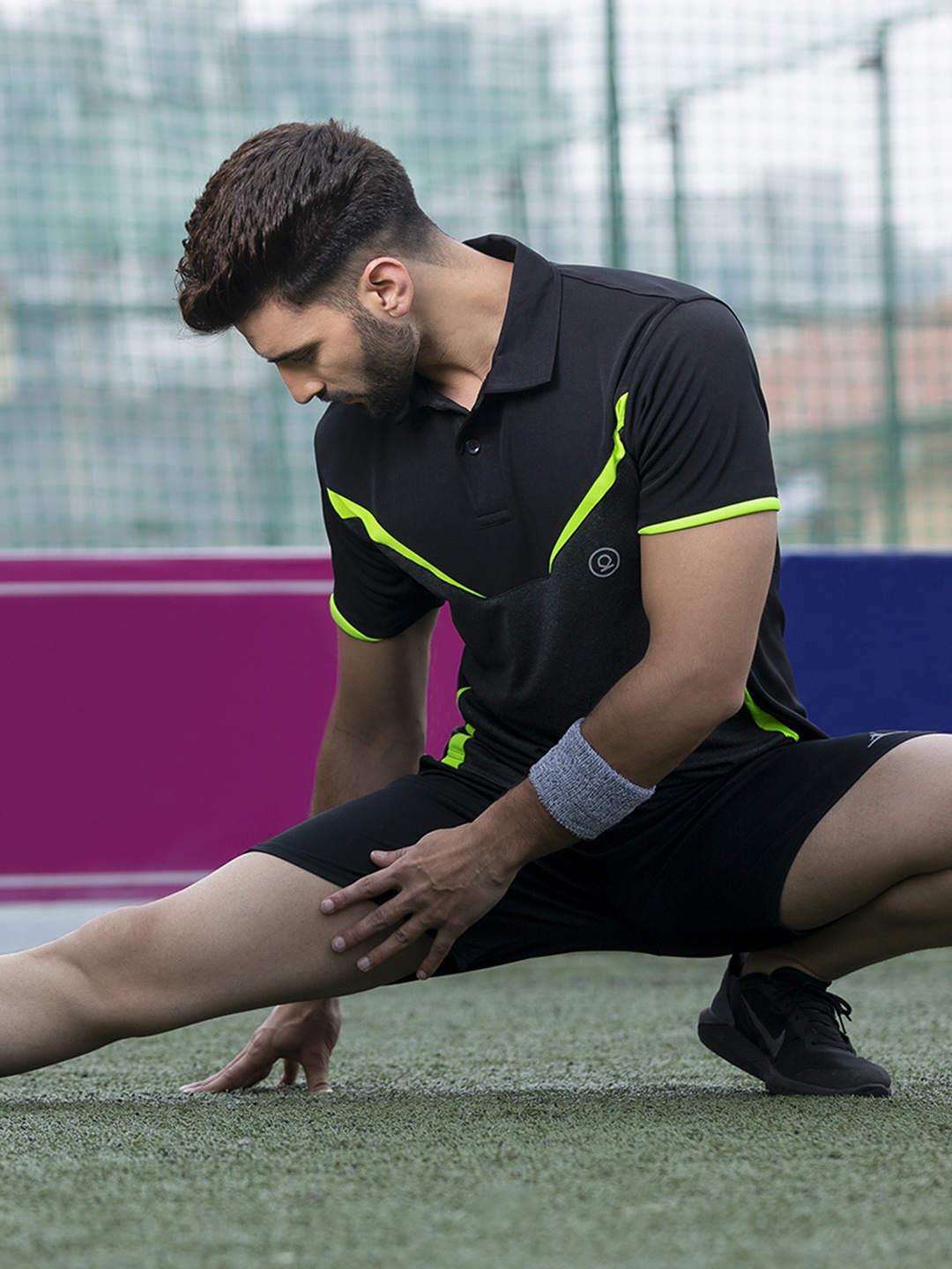 

CHKOKKO Men Black & Fluorescent Green Polo Collar Training or Gym T-shirt