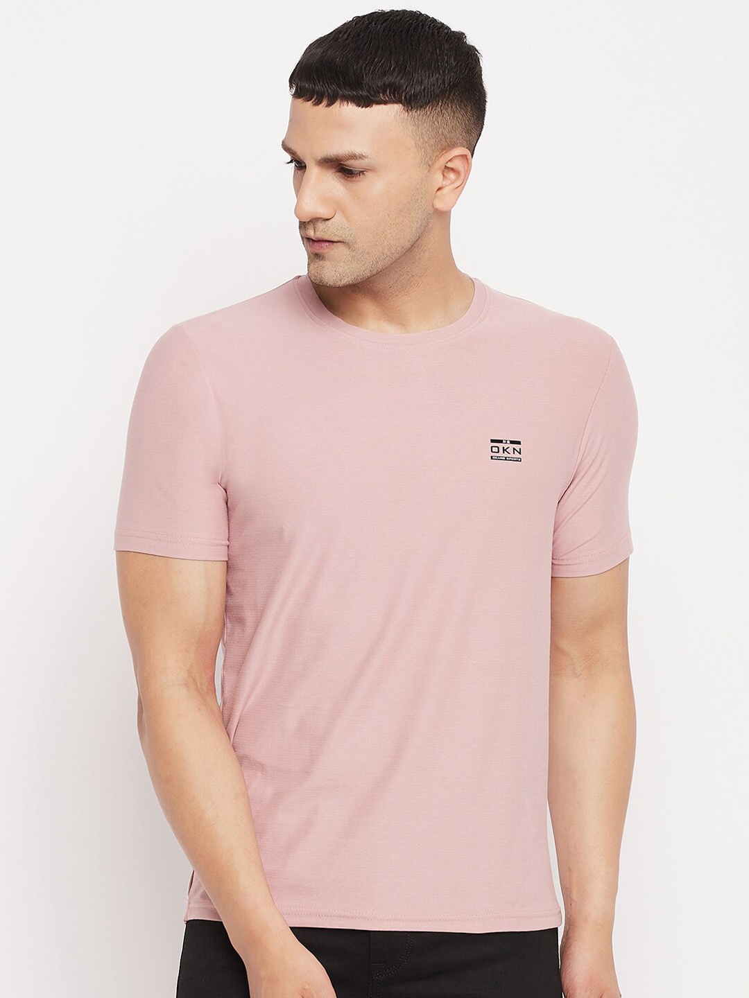

Okane Men Pink Solid T-shirt